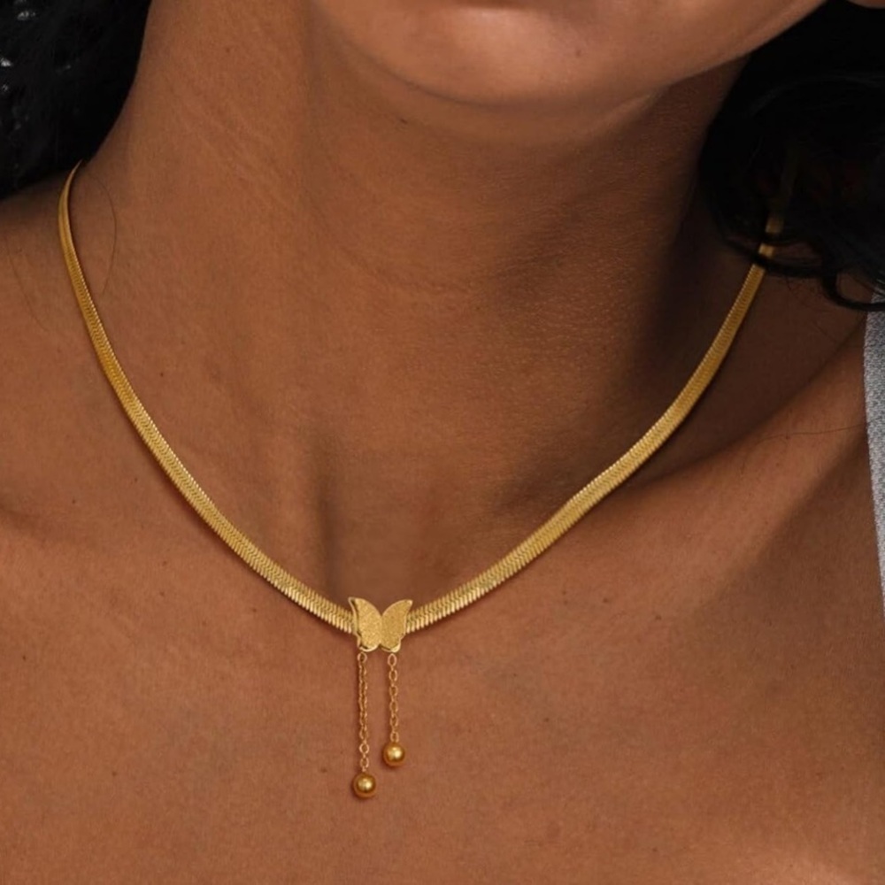 Herringbone style 14k plated gold necklace with butter slide pendant